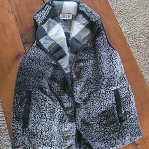 Bke shepard vest with black and white plaid lining